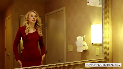 Flawless blonde model in a hotel suite