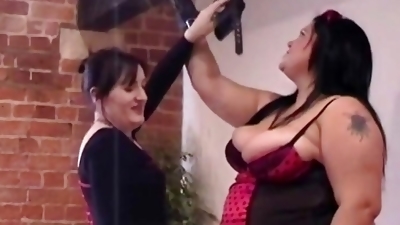 Mistress Danielle gaffer tapes her BBW slaves huge tits
