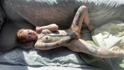 Cute tattooed teen lazy masturbating in the morning sunlight