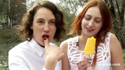American Babes Explore Each Other's Sexy Bodies Outdoors - Redhead eats icecream and her lesbian girlfriend