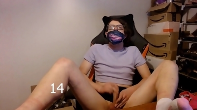Naughty femboy teases in socks and has double cumshots while using a dildo gag for 68 seconds, then indulges in playing with cum lube