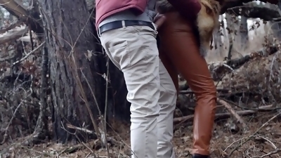 Risky public sex with a redhead teen in the winter forest