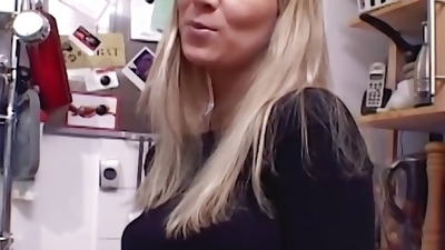 A busty body German blonde pleasing her pussy with her glass dong