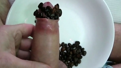 Squirrel Hoarding with Coffee Beans into my Uncut dick then cumming on my leg
