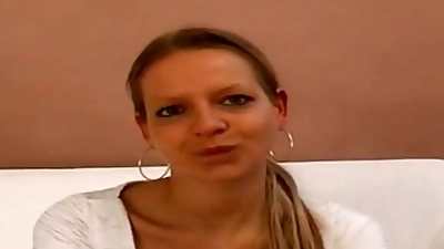 Sexy German blonde in heat masturbates her wet pussy in front of the spotlight