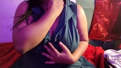 Busty Indian bhabhi teases with her luscious boobs, pressing and sucking her nipples