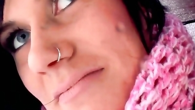 A busty dark haired slut from Germany loves fingering her pierced muff