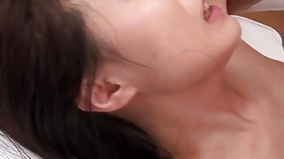 Japanese babe Hina Aizawa  sucks the masseur's hard cock uncensored.