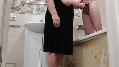 Stepmom got excited when she jerked off his cock in the bathroom and gave a blowjob before she asked to fuck her
