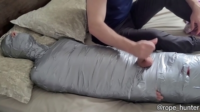 Bearded dominant master uses mummified sub as his obedient sex toy