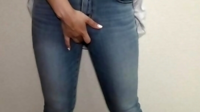 Cute girl in tight jeans stains her jeans with masturbation juice.