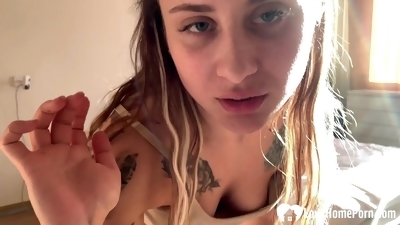 Nasty teen with tattoos shoves a dildo inside her