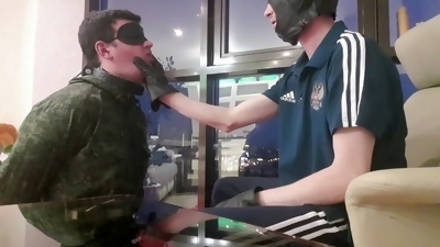 Young military boy dominated by two Russian cops in a hardcore BDSM orgy with lots of foot fetish and face slapping