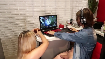 The girl used the guy's penis while he was playing League of Legend