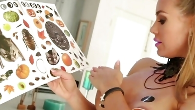 Nicole Aniston plays with Halloween stickers then her wet
