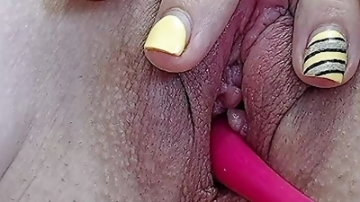 Fleshy pussy throbbing from a vibrator