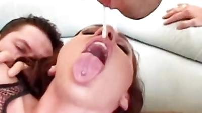 Skinny whore bends over for two thick cocks and enjoys being facialized