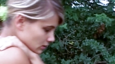 A sweet blonde German teen gets her hairy muff banged in the woods