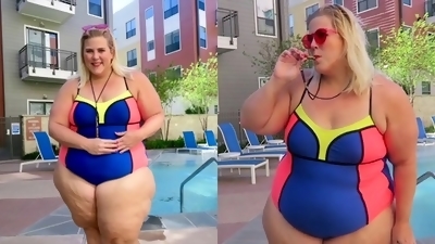 Curvy babe flaunts her figure in a stunning swimsuit
